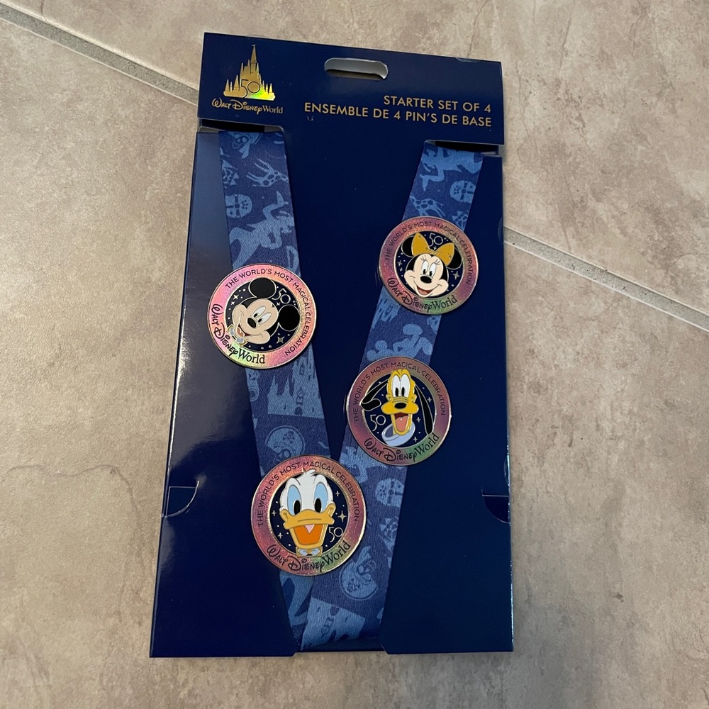 Disney Parks 50th Anniversary Starter Set of 4 Pins w/ Characters & Lanyard NEW